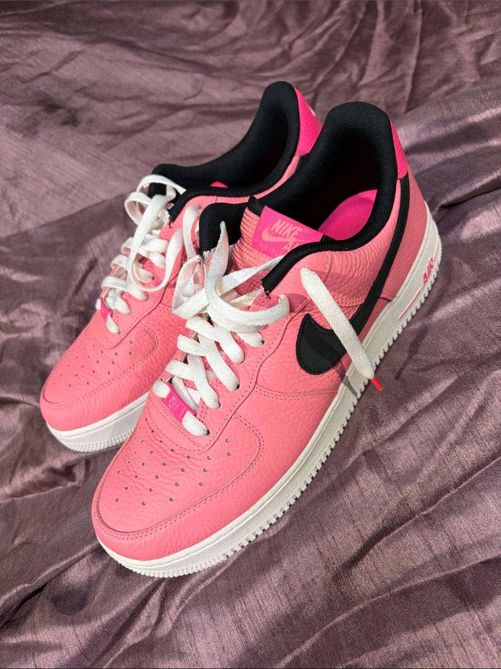 Nike Women's Pink and Black Low-Top Sneakers